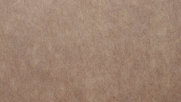 istock Close-Up of Textured Brown Kraft Paper Surface 2253910190