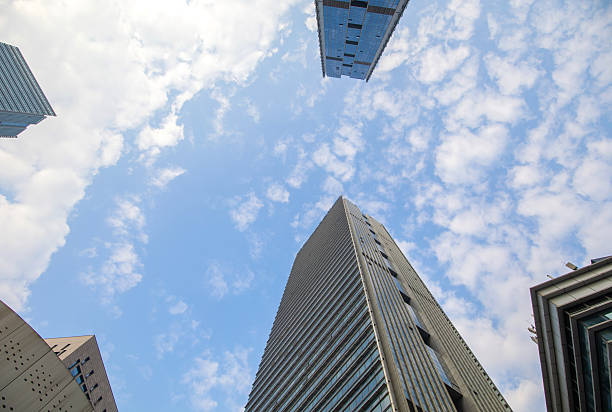 Looking up at city buildings
