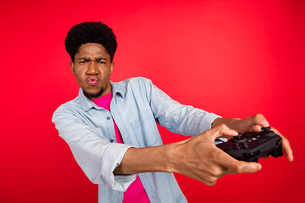 istock Portrait of attractive cheerful curious brunet guy thinking copy empty space isolated over bright red color background 2253914931