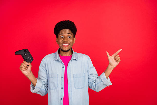 istock Portrait of attractive cheerful curious brunet guy thinking copy empty space isolated over bright red color background 2253914936