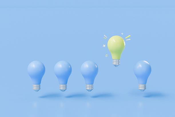 istock 3D Outstanding glowing yellow light bulb among blue light bulbs. Creative idea and innovation, brainstorming for inspiration concept. Minimal Cartoon icon isolated on blue background 3D rendering. 2253916142