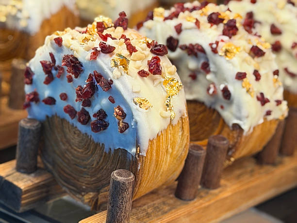 Image of baked puff pastry with white chocolate, cranberries, raspberries, and chopped nuts, freshly baked breakfast treat