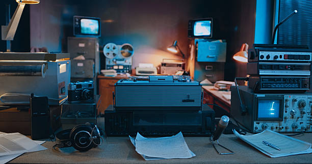 Secret radio operation in a secure underground room for securing military intel or journalism. Retro radio listening and spying devices