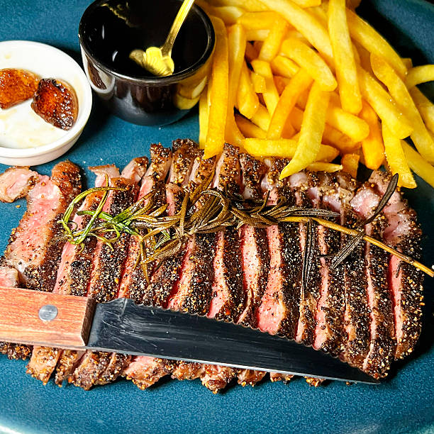 Beef in slices with  french  fries