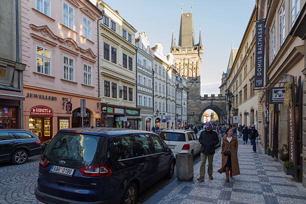 Prague, Czech Republic - 3 November 2025: People walk in the street at the Old Town (Mala Strana district) in Prague, the capital and largest city in the Czech Republic and the historical capital of Bohemia