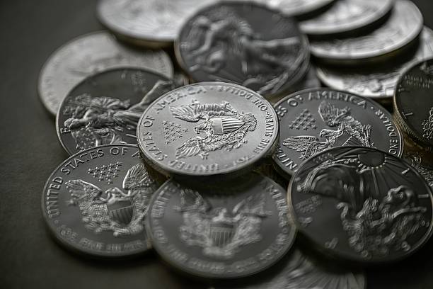 istock High resolution close up color image of American Silver Eagle Coins Stacked in Pile, Silver Bullion Investment Concept 2253928368