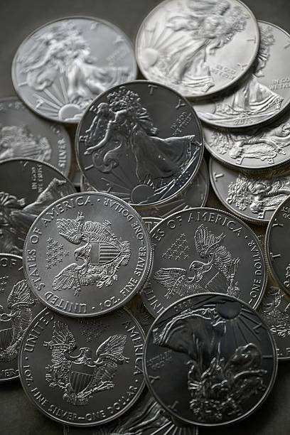 istock High resolution close up color image of American Silver Eagle Coins Stacked in Pile, Silver Bullion Investment Concept 2253928395