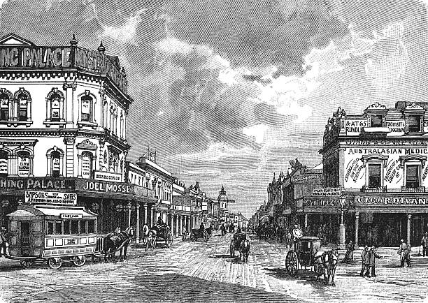istock King William Street in Adelaide with buildings, advertisements, horse-drawn carriages, and tramways, showing bustling colonial city life, old vintage illustration, 1899. 2253931232