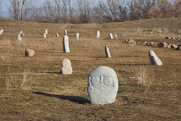 Kurgan stelae, Balbal, ancient historical stones on the territory of complex Burana Tower in Kyrgyzstan