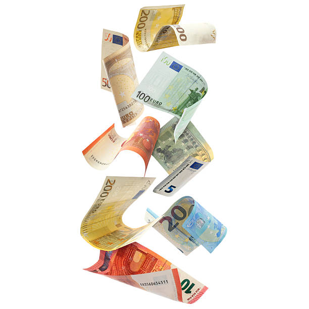 istock Money flying. Euro bills falling against white background 2253933813