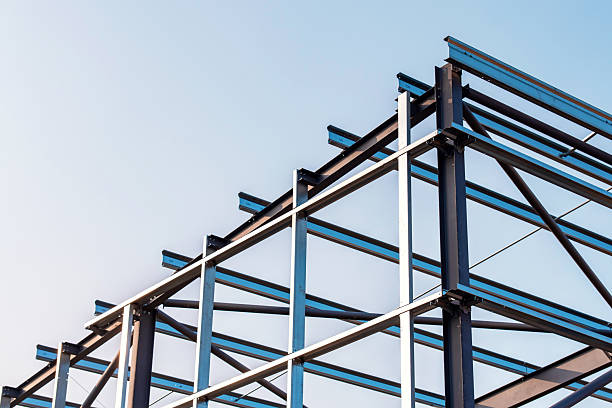 istock Framework of  modern steel frame building erected against a clear sky during the day showcasing steel construction and architectural design 2253936405