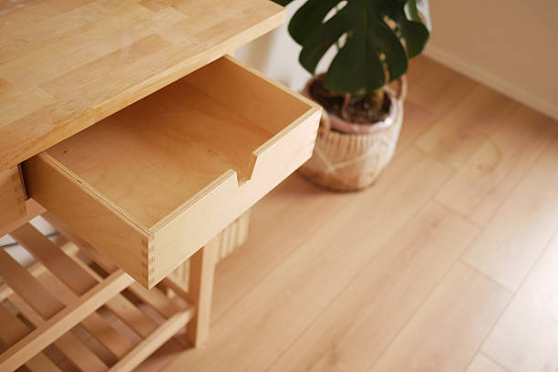 istock Wooden drawer opened in a modern interior setting 2253940056