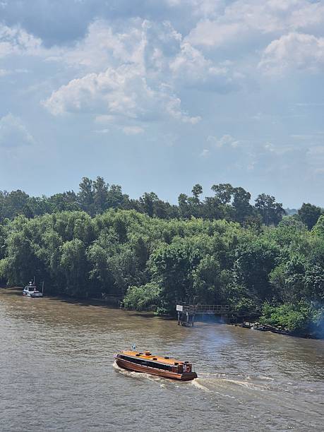 istock Traditional Wooden Commuter Boats Navigating 2253940265