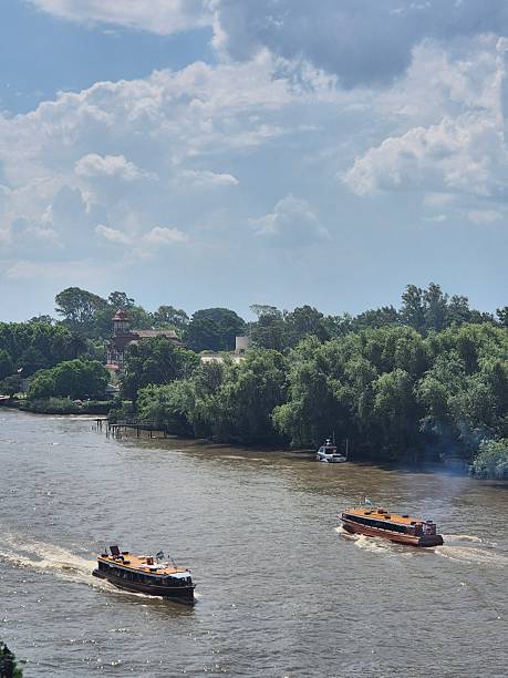 istock Traditional Wooden Commuter Boats Navigating 2253940268