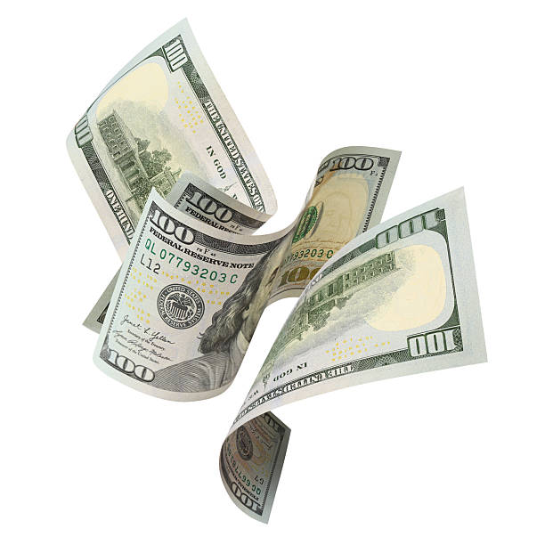 istock Flying hundred dollar banknotes, isolated on white background 2253942541