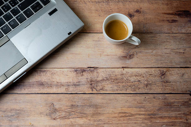 istock Minimal Home Office Desk With Coffee And Laptop 2253944420
