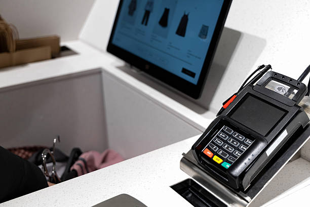 istock Self checkout touchscreen payment in modern fashion store. 2253948866