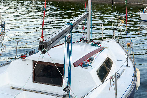 Close-up of a boat on the sea. Driving motorboat on holiday. Boat rental.  Rhodes, Greece. Motorboat parts. Summer vacation at the sea. Tourist boat trip.