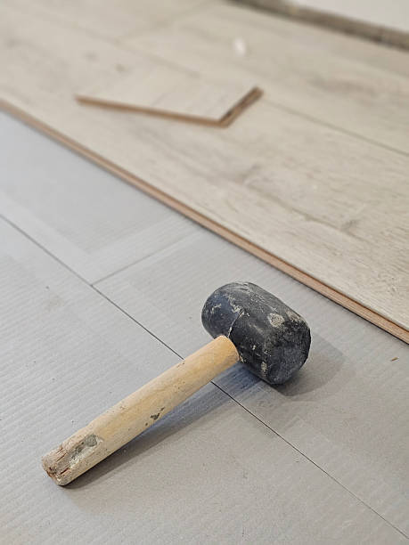 istock Tool on floor used for laying tiles or flooring at construction site during 2253955478
