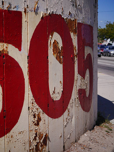 An aged and weathered sign in downtown LA has left an untethered 505. 2013