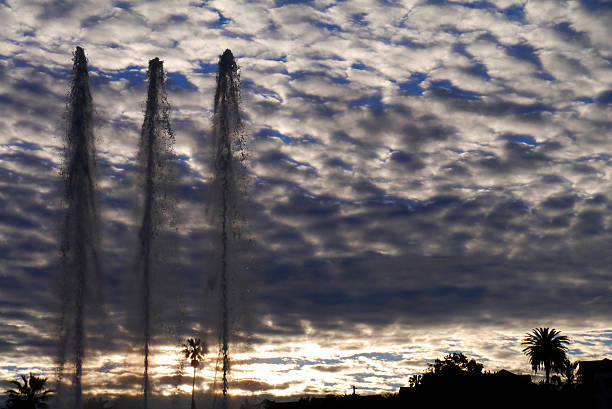 Unusual cloud formations over Echo Lake at Sunrise. It felt like the fountain was celebrating. 2014