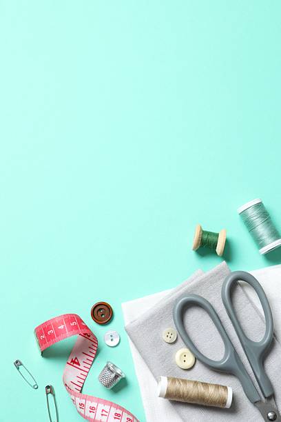 istock Flat lay composition with different sewing supplies on color background 2253959631