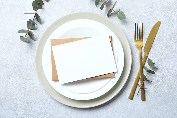 istock Wedding stationery invitation card mockup on grey background with eucalyptus, Menu card mockup with festive wedding or birthday table setting, ceramic plate. Minimal blank card mockup 2253959738