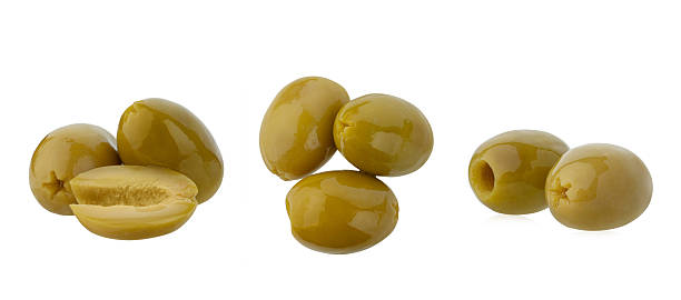 istock Green canned olives isolated on white background 2253962994