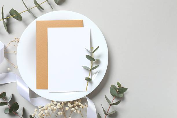 istock Wedding stationery invitation card mockup on grey background with eucalyptus, Menu card mockup with festive wedding or birthday table setting, ceramic plate. Minimal blank card mockup 2253966794