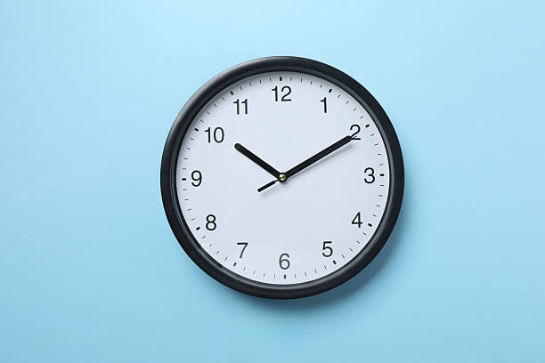 istock Big beautiful stylish clock on color background 2253967043