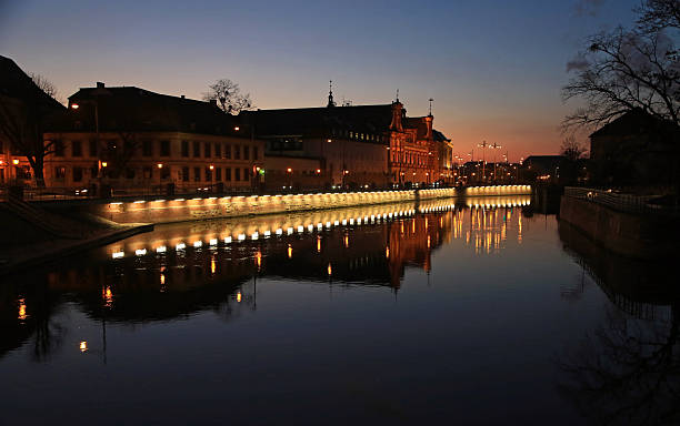 Walking on Odra River after sunset in historic part of Wroclaw, Poland