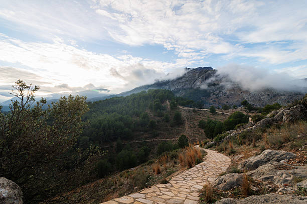 Backlit landscape of the Sierra de Mariola mountain range from the area around Cocentaina Castle, Alicante, Spain