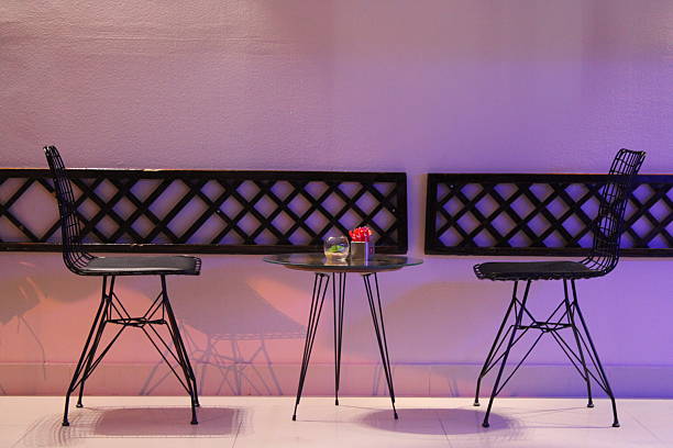 Two chairs and table in a coffee shop