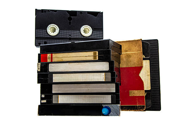 istock Stack of old VHS video cassette tapes with blank labels isolated on a white background. 2253973244