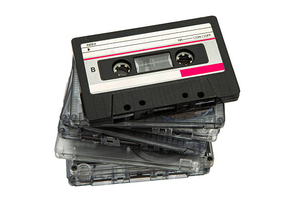 istock Stack of vintage audio cassette tapes with blank labels isolated on a white background. 2253973246