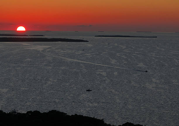 Sunset in the Florida Key with Boats, Docks and iconic sunsets.