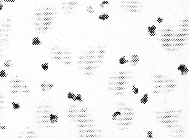 Minimal black-and-white halftone blotches and scattered ink specks on textured paper, resembling stains or smudges