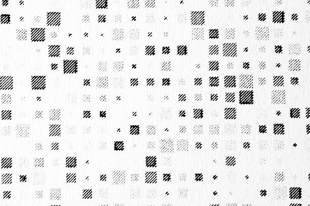 Extreme close-up of scattered black halftone squares on textured white paper, forming a dynamic geometric background for print and digital designs