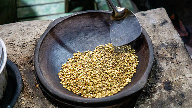 istock Roasting coffee in the traditional way and using pottery (Indonesian call it kreweng) 2253980201