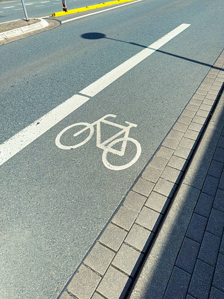 istock Implementing Bicycle Lane Marking on Urban Roadways is essential for establishing a safer cycling environment, which in turn promotes healthy commuting options accessible to everyone in the community 2253980965