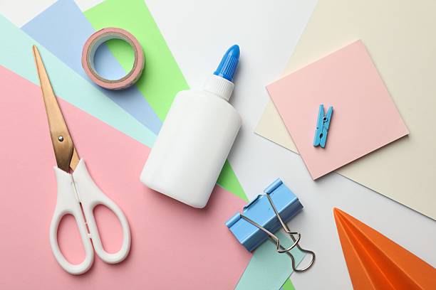 istock Glue and other stationery on white background, flat lay 2253992157