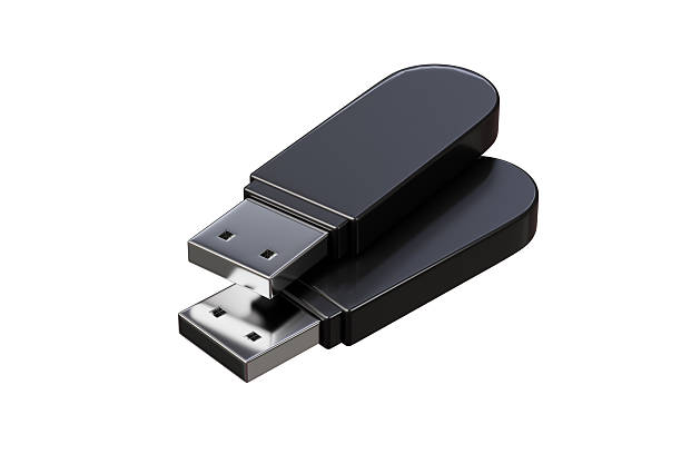 istock 3d usb flash drives icon. data storage concept. Minimal cartoon black thumb drive memory sticks pair closeup for file transfer and backup isolated on white background. 3d render. 2253997743