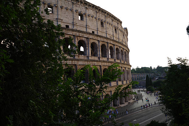 istock facade of the Flavian amphitheater with a tree next to it 2254005221