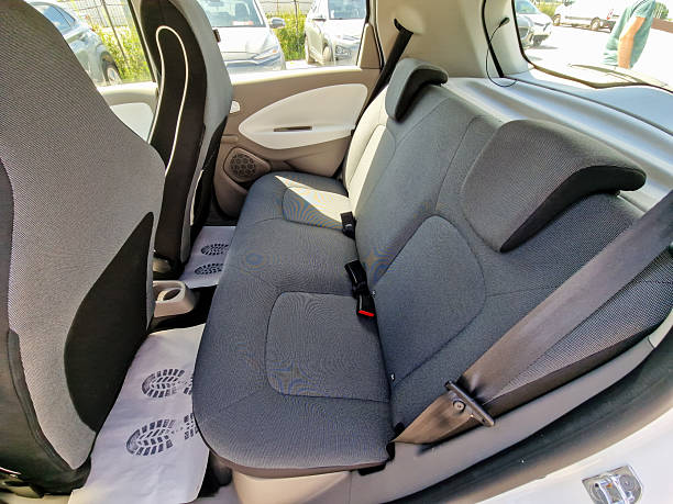 istock Experience a stylish and comfortable car interior featuring unique patterned seat covers designed specifically for the backseat of your compact vehicle, elevating both aesthetics and comfort 2254008442
