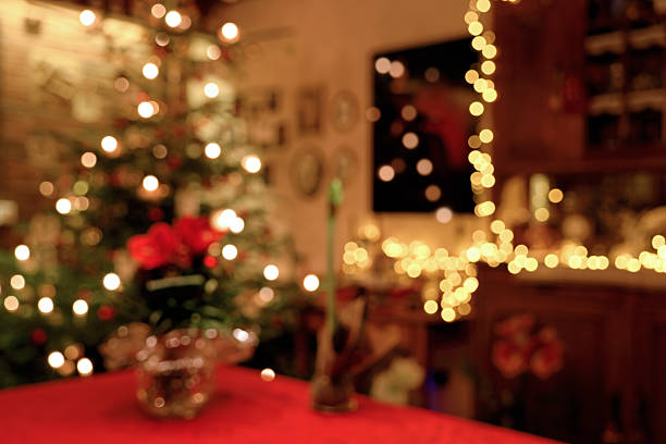 istock Abstract Christmas room impression with Christmas flower table decoration and Christmas tree background 2254012525