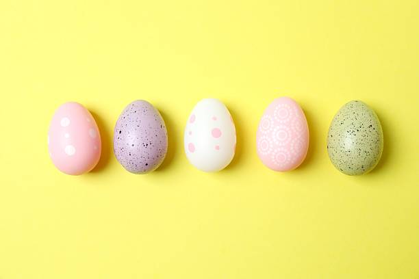istock Happy Easter. Colorful eggs on color background, space for text or advertising 2254012588
