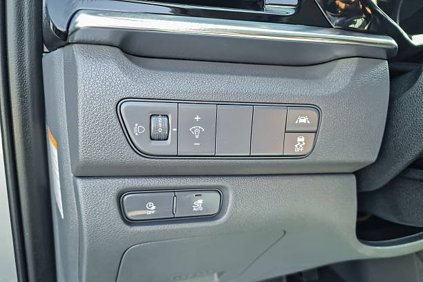 istock Control panel with various buttons for car features near the driver's seat in a modern vehicle, showcasing functionality for enhanced driving experience 2254014901