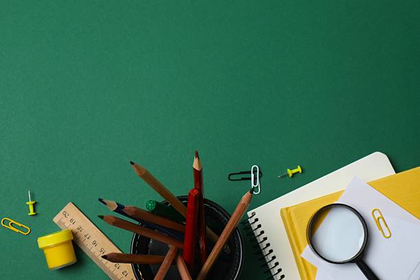 istock Flat lay with school stationery on green background, top view 2254015040