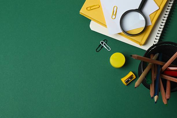 istock Flat lay with school stationery on green background, top view 2254015041