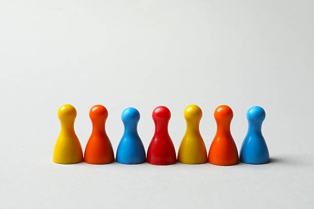 istock Group of pawns on a light background 2254015333